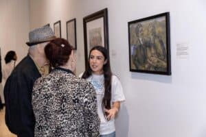 DLP Student docent at CSUN, where they led guests through the new traveling exhibit "Through the Eyes of David Labkovski"