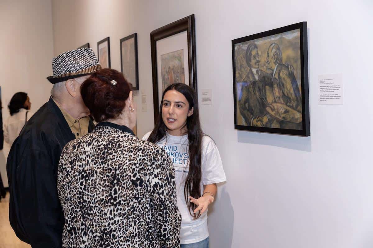 DLP Student docent at CSUN, where they led guests through the new traveling exhibit "Through the Eyes of David Labkovski"