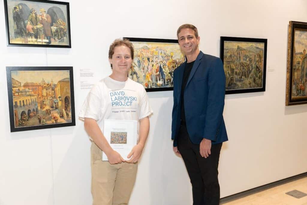DLP Student docent at CSUN, where they led guests through the new traveling exhibit "Through the Eyes of David Labkovski"