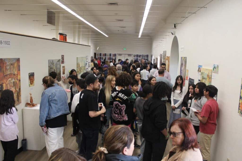Opening day, over 120 people attended the exhibit “Documenting History through Art" at the Canoga Park Youth Art Center - Los Angeles Department of Arts and Culture.