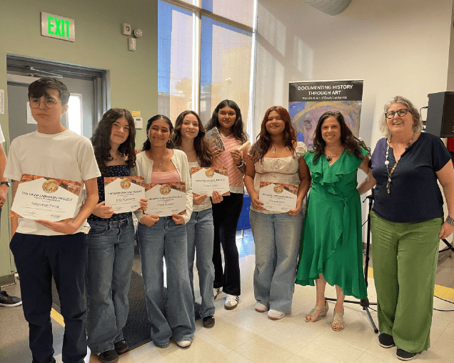 Leora Raikin, DLP Founder & Executive Director, Resa Nikol, DLP Director of Education, with students recognized for their outstanding achievments during the semester and nominated as student ambassadors for the DLP efforts during the program.