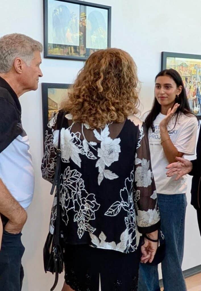 DLP Student docent at CSUN, where they led guests through the new traveling exhibit "Through the Eyes of David Labkovski"